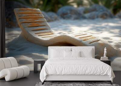 A simple beach chair rests on soft sand, inviting relaxation in a serene coastal environment. Wall mural