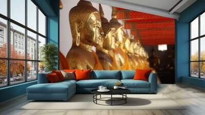 Golden statues of Buddha in Wat Phra temple of Bangkok, Thailand Wall mural