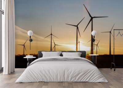 Silhouettes of wind turbines in the rising sun Wall mural