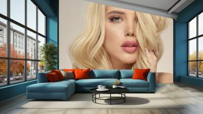 Attractive female beauty model with luxurious blonde hair, close up Wall mural