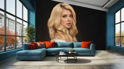 Blonde woman portrait, attractive adult girl in studio over black background, close up portrait Wall mural