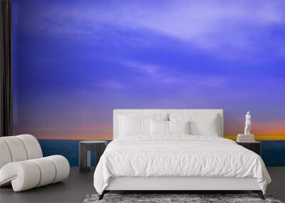 Beautiful blue sunset in the winter season. Wall mural