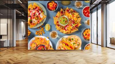 Mexican food variety, shot from above. Nachos, guacamole, tequila, tacos and other dishes, a flat lay Wall mural