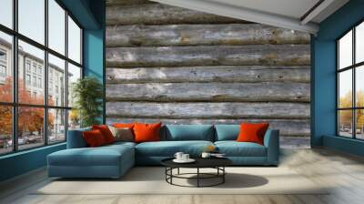 Old weathered grey wooden wall of old log cabin house, horizontal texture for background Wall mural