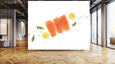 Salmon, shot from the top on a white background with dill, pepper, and lemon, with a place for text Wall mural