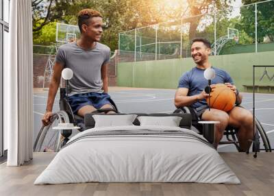 Basketball player, men and team in wheelchair for sports break, rest and fitness on training court. People with a disability, athletes and happy with ball, mobility equipment and exercise workout Wall mural