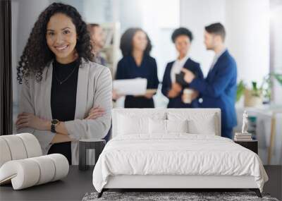 Smile, crossed arms and portrait of businesswoman in the office with confidence, happiness and collaboration. Career, professional and young female lawyer from Mexico with legal team in the workplace Wall mural