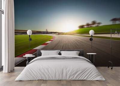 Sunset motion blurred race track. Wall mural