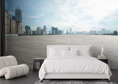 Wide empty concrete floor with  cityscape view Wall mural