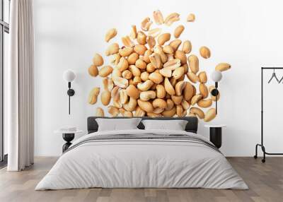 A pile of roasted peanuts on a white background. Wall mural