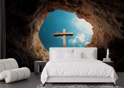 A wooden cross is in the center of a cave Wall mural