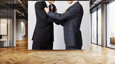 two young businessmen fighting Wall mural