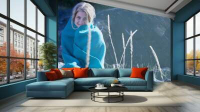 Young Woman wrapped in blanket Wall mural