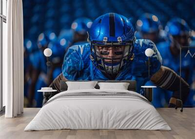 American football player in blue uniform holding a ball, focused, with teammates in the background. Generative AI Wall mural