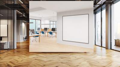 Blank framed poster mockup displayed on a white wall in a modern office with desks, chairs, and computers. Concept for office interior design. 3D Rendering Wall mural