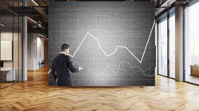 Businessman and graph Wall mural