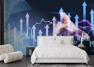 Businessman interacting with financial charts and graphs on transparent screen. Wall mural