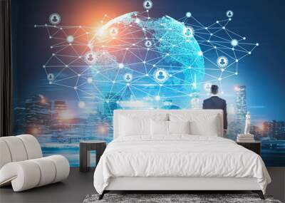 Businessman looking at network in sky Wall mural