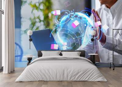 Businessman waving hand to laptop, earth globe and virtual connection Wall mural