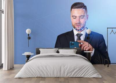 Businessman working with smartphone, facial recognition and auth Wall mural