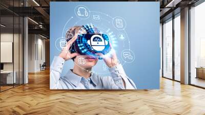 Businesswoman in vr glasses is holding helmet with digital inter Wall mural