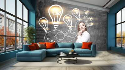 Idea concept with thoughtful female Wall mural