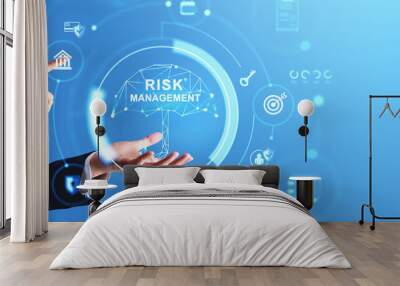 Man hands and finger touch glowing risk management hologram with icons Wall mural