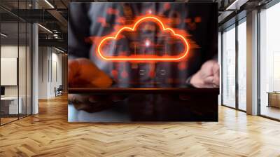 Person holding a tablet with a glowing cloud symbol above it, representing cloud data storage technology on a dark background. Generative AI Wall mural