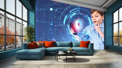 School boy looking at the phone, pemsive portrait with cybersecurity hologram Wall mural