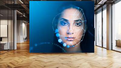 Serious attractive businesswoman with facial recognition by digi Wall mural