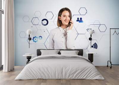 Smiling woman on phone, network icons Wall mural