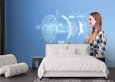 Woman using tablet, face recognition hologram and data security Wall mural