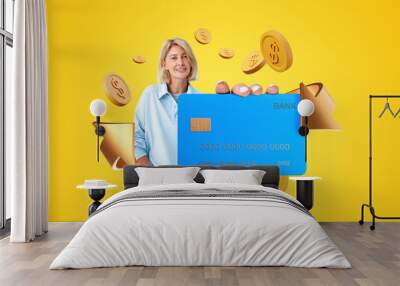 Woman with credit card and cashback icons Wall mural