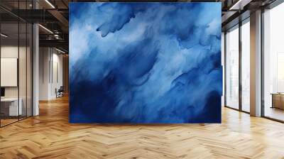 Chaotic brush strokes in black and navy blue create an abstract watercolor background, resembling a dramatic, stormy sky with clouds. Wall mural