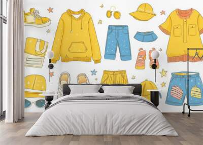 A colorful cartoon drawing showing men's and women's clothing, shoes, and hats. The items are yellow and have a cute design with stars and sunbeams. It includes both sporty and everyday outfits. Wall mural