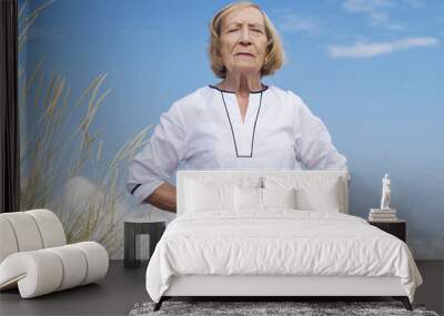 An old woman practicing Tai chi Wall mural