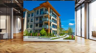 Brand new apartment building on sunny day in British Columbia, Canada. Wall mural