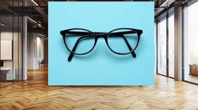 Spectacles blue background Wall mural