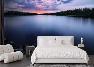 A cloudy sunset i a summer night in sweden Wall mural