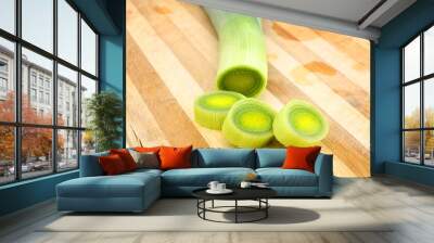 Sliced Leeks on wooden board Wall mural