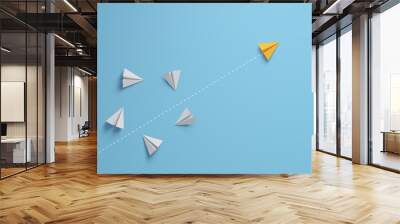 Individual and innovator leader paper airplane changing direction. Leadership concept. Wall mural