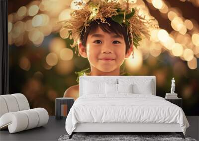 A multiracial child smiling and posing for the camera while wearing a lei and a flower crown. Wall mural