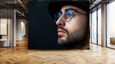 a photo showing a multiracial man wearing glasses and a hat, looking directly at the camera with a n Wall mural