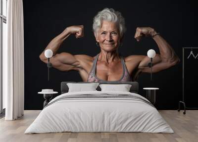 A woman with a muscular build is flexing her arms. Concept of strength and confidence Wall mural