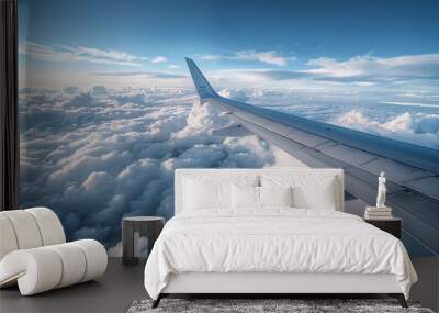 Airplane Wing Above Clouds During Daytime Flight Wall mural