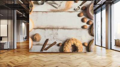 Copy Space image of Variety of donuts over a rustic background shot from overhead Wall mural