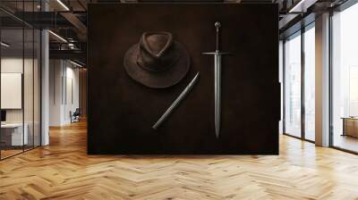 witcher hat and medieval sword arranged on a dark moody background Wall mural