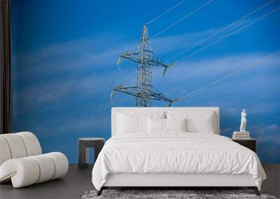 electrical distribution tower on blue sky Wall mural