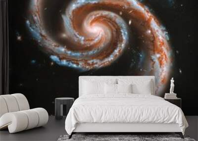 A spiral galaxy with two prominent turns, resembling the shape of an orange and blue rose in space Wall mural