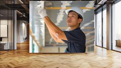 High-quality, high-resolution photos featuring Chinese people wear black polo shirt no cap style uniform demonstrating how to repair a ceiling at office with a minimalist aesthetic, including an engin Wall mural